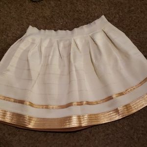 Textured, banded skirt.